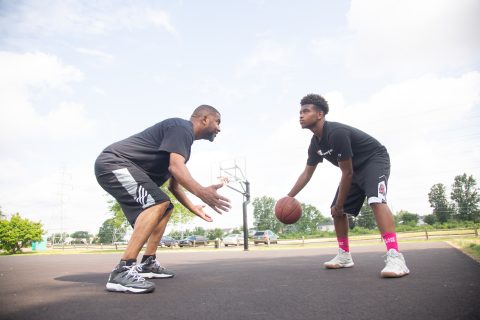 Cory Jackson, left, with his son, Isaiah. | PC: Jean-Ires Michel