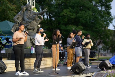 Caryn Cruz (second from left) participated in a vespers program on the steps of Pioneer Memorial Church.