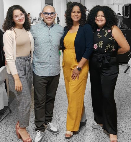 Carlos with wife, Karen Avilés, and their two daughters, Karla and Kiara