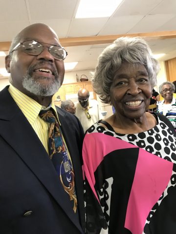 Elodia Jones is pictured in 2018 at her 90th birthday party with Michael Terrell, building chairman of Peterson-Warren Academy. 