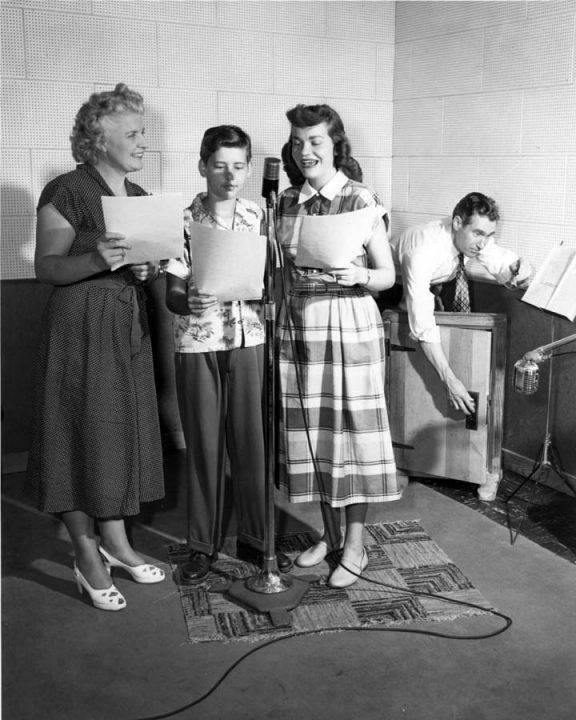 Irene Lovell (the 1st Aunt Sue) and Uncle Dan (Stanley Hill) working in the studio with some child actors.