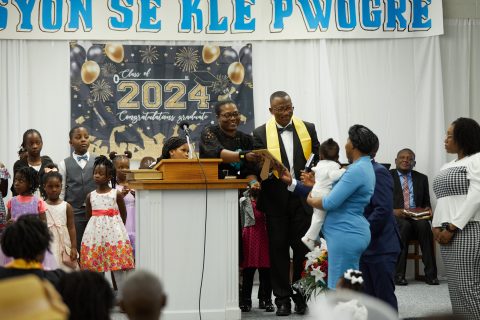 “We believe that God wanted that place for us,” Pastor Michelet William said. “God is in control and He always has a plan for His people. …  Everything is coordinated by Him in His time.” William, pictured center, conducted a baby dedication on May 25, 2024.