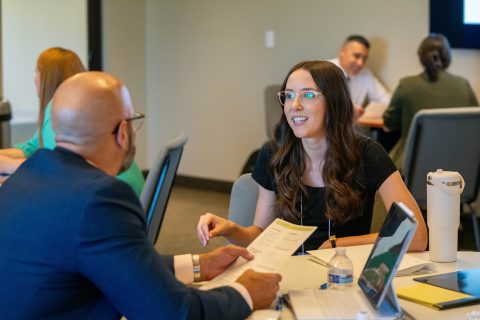 After the noon meal, there are mock interviews where the administrators are matched with a student. Here Michigan Superintendent Jeremy Hall listens to Kelli Coffen.