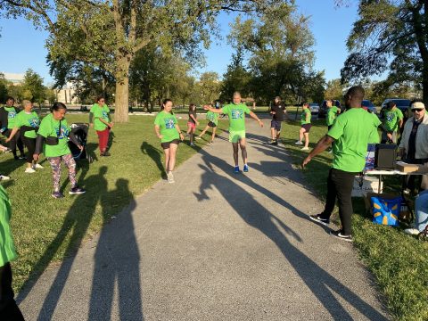 Participants stretching and warming up before the 5k begins