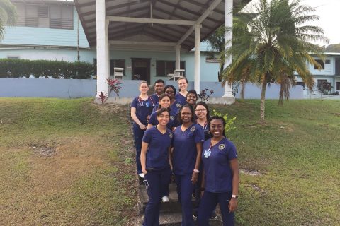 Nursing students and faculty stand outside of La Loma Luz Adventist Hospital. Photo by: Students