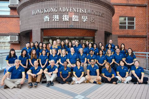 The Hong Kong Adventist Academy staff gathered for a yearbook photo. Credit: William Rios