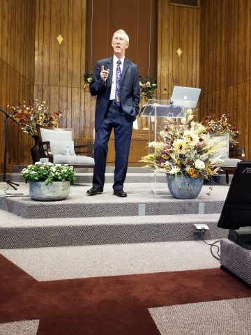 Former Pastor Dan Hall was the guest speaker at the centennial celebration. | Credit: Debbie Burns