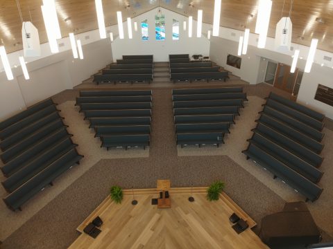 The structure has three-wings which are based on the Holy Trinity: A Sanctuary wing for worship and praise of the Father, a Classroom Wing from to learn from Christ our teacher, and the Fellowship Hall to bond believers as the Holy Spirit bonds us together and to the Godhead.