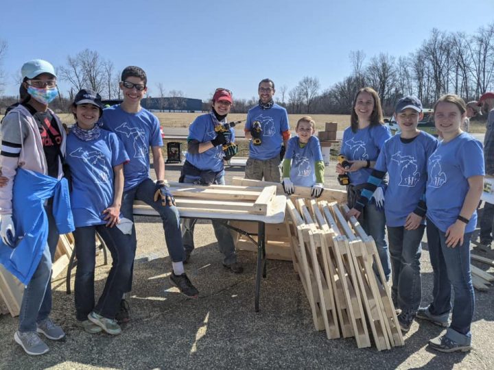 Lansing Church youth conducted “Fieldwork,” building beds for families in need.