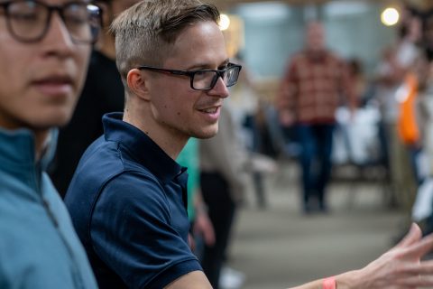 Michigan Youth Rush leader Seth Roberts participates in a group discussion